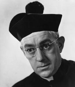 Alec Guinness in his role as "Father Brown"